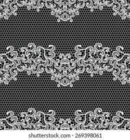 White lacy seamless pattern with flowers on black background