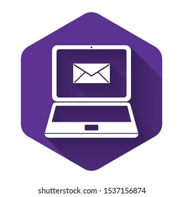 White Laptop with envelope and open email on screen icon isolated with long shadow. Email marketing, internet advertising concepts. Purple hexagon button. Vector Illustration