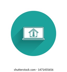 White Laptop with house temperature icon isolated with long shadow. Thermometer icon. Green circle button. Vector Illustration