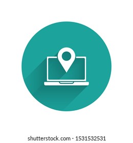 White Laptop with location marker icon isolated with long shadow. Green circle button. Vector Illustration