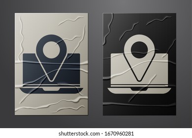 White Laptop with location marker icon isolated on crumpled paper background. Paper art style. Vector Illustration
