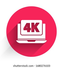 White Laptop screen with 4k video technology icon isolated with long shadow. Red circle button. Vector Illustration