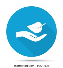 White Leaf In Hand icon on blue button isolated on white