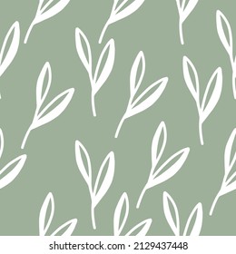 Patrón de hojas blancas en un fondo verde. Textura vectorial. Impresión elemental.