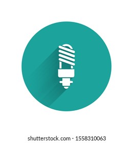 White LED light bulb icon isolated with long shadow. Economical LED illuminated lightbulb. Save energy lamp. Green circle button. Vector Illustration