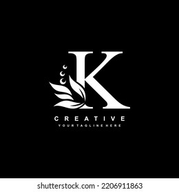 White letter K logo design with flourish ornaments. logo K with floral and leaf ornaments. K beautiful logo. luxury letter K logo design