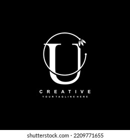 plantilla de logotipo U de letra blanca con ornamentos florales y líneas circulares. diseño lujoso y elegante del logotipo de U. hermosa letra U vector logotipo. icono U