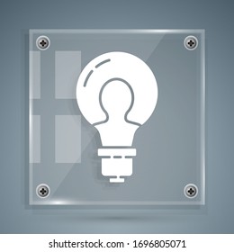 White Light bulb with concept of idea icon isolated on grey background. Energy and idea symbol. Inspiration concept. Square glass panels. Vector Illustration