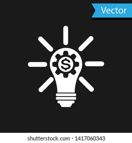 White Light bulb with gear inside and dollar symbol icon isolated on black background. Fintech innovation concept. Vector Illustration