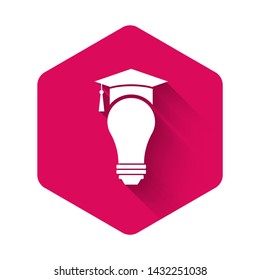 White Light bulb and graduation cap icon isolated with long shadow. University Education concept. Pink hexagon button. Vector Illustration