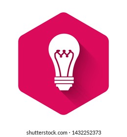 White Light bulb icon isolated with long shadow. Energy and idea symbol. Lamp electric. Pink hexagon button. Vector Illustration