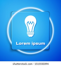 White Light bulb icon isolated on blue background. Energy and idea symbol. Lamp electric. Blue square button. Vector Illustration
