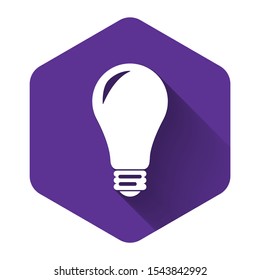 White Light bulb icon isolated with long shadow. Energy and idea symbol. Lamp electric. Purple hexagon button. Vector Illustration