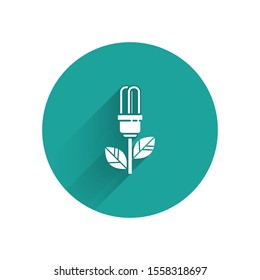 White Light bulb with leaf icon isolated with long shadow. Eco energy concept. Alternative energy concept. Green circle button. Vector Illustration