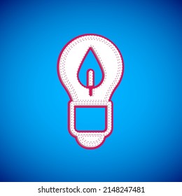 White Light bulb with leaf icon isolated on blue background. Eco energy concept. Alternative energy concept.  Vector
