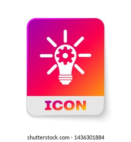 White Light bulb with rays shine and gear inside icon isolated on white background. Innovation concept. Rectangle color button. Vector Illustration
