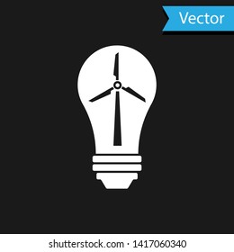 White Light bulb with wind turbine as idea of eco friendly source of energy icon isolated on black background. Alternative energy concept. Vector Illustration
