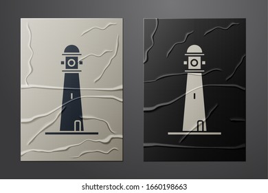 White Lighthouse icon isolated on crumpled paper background. Paper art style. Vector Illustration