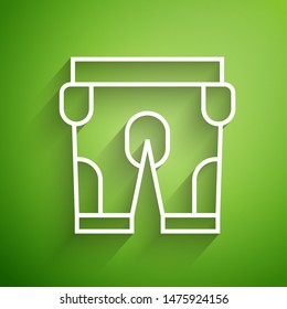 White line American football shorts icon isolated on green background. Football uniform sign.  Vector Illustration