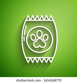 White line Bag of food for pet icon isolated on green background. Food for animals. Pet food package. Dog or cat paw print.  Vector Illustration