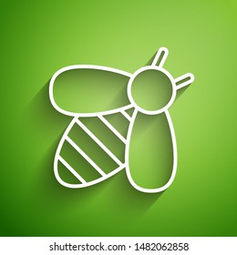 White line Bee icon isolated on green background. Sweet natural food. Honeybee or apis with wings symbol. Flying insect.  Vector Illustration