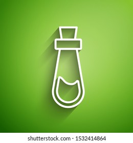 White line Bottle with potion icon isolated on green background. Flask with magic potion. Happy Halloween party.  Vector Illustration