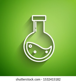 White line Bottle with potion icon isolated on green background. Flask with magic potion. Happy Halloween party.  Vector Illustration