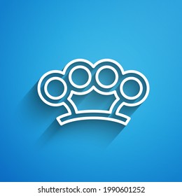 White line Brass knuckles icon isolated on blue background. Long shadow. Vector