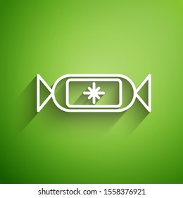 White line Candy icon isolated on green background. Merry Christmas and Happy New Year.  Vector Illustration