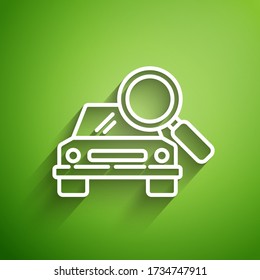 White line Car search icon isolated on green background. Magnifying glass with car.  Vector Illustration