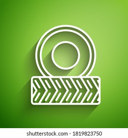 White line Car wheel icon isolated on green background.  Vector Illustration