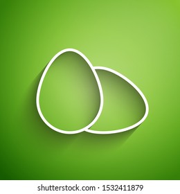 White line Chicken egg icon isolated on green background.  Vector Illustration