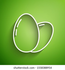 White line Chicken egg icon isolated on green background.  Vector Illustration