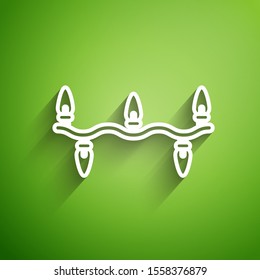 White line Christmas lights icon isolated on green background. Merry Christmas and Happy New Year.  Vector Illustration