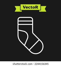 White line Christmas stocking icon isolated on black background. Merry Christmas and Happy New Year.  Vector
