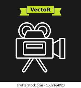 White line Cinema camera icon isolated on black background. Video camera. Movie sign. Film projector.  Vector Illustration