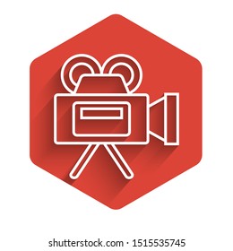 White line Cinema camera icon isolated with long shadow. Video camera. Movie sign. Film projector. Red hexagon button. Vector Illustration