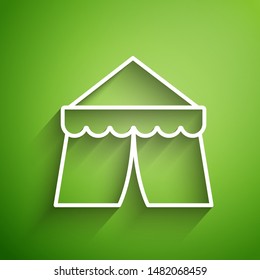 White line Circus tent icon isolated on green background. Carnival camping tent. Amusement park.  Vector Illustration