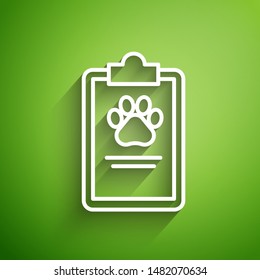 White line Clipboard with medical clinical record pet icon isolated on green background. Health insurance form. Medical check marks report.  Vector Illustration