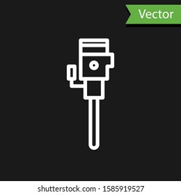 White line Construction jackhammer icon isolated on black background.  Vector Illustration