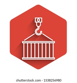 White line Container on crane icon isolated with long shadow. Crane lifts a container with cargo. Red hexagon button. Vector Illustration