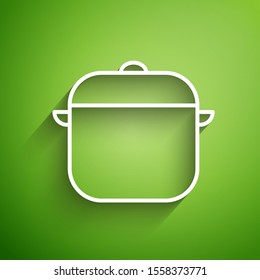 White line Cooking pot icon isolated on green background. Boil or stew food symbol.  Vector Illustration