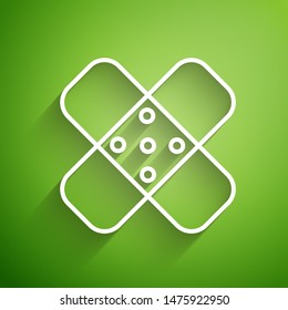 White line Crossed bandage plaster icon isolated on green background. Medical plaster, adhesive bandage or flexible fabric bandage.  Vector Illustration
