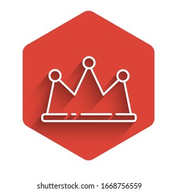 White line Crown icon isolated with long shadow. Red hexagon button. Vector Illustration