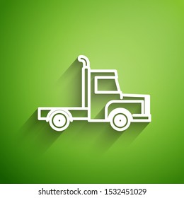 White line Delivery cargo truck vehicle icon isolated on green background.  Vector Illustration