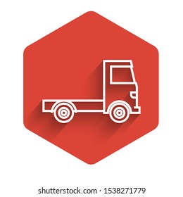 White line Delivery cargo truck vehicle icon isolated with long shadow. Red hexagon button. Vector Illustration