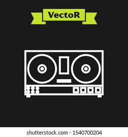 White line DJ remote for playing and mixing music icon isolated on black background. DJ mixer complete with vinyl player and remote control.  Vector Illustration
