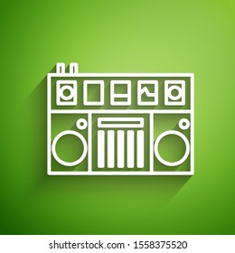 White line DJ remote for playing and mixing music icon isolated on green background. DJ mixer complete with vinyl player and remote control.  Vector Illustration