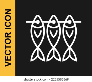 White line Dried fish icon isolated on black background.  Vector