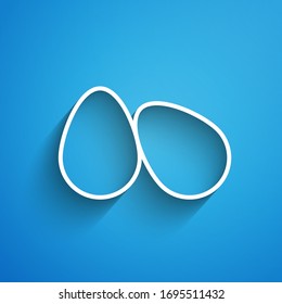 White line Easter eggs icon isolated on blue background. Happy Easter. Long shadow. Vector Illustration
